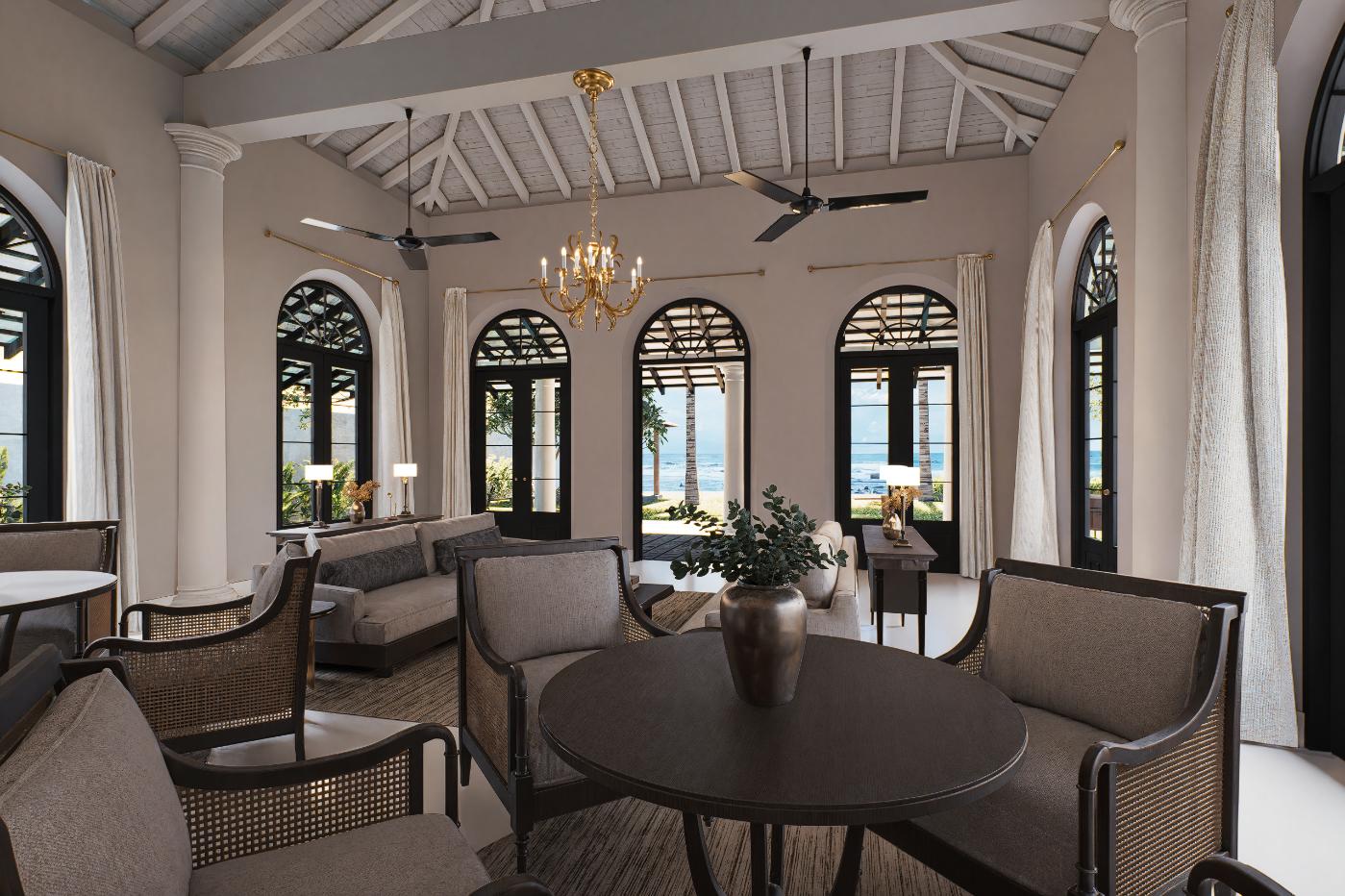 Spacious interior with arched windows & ocean view at IF Villa