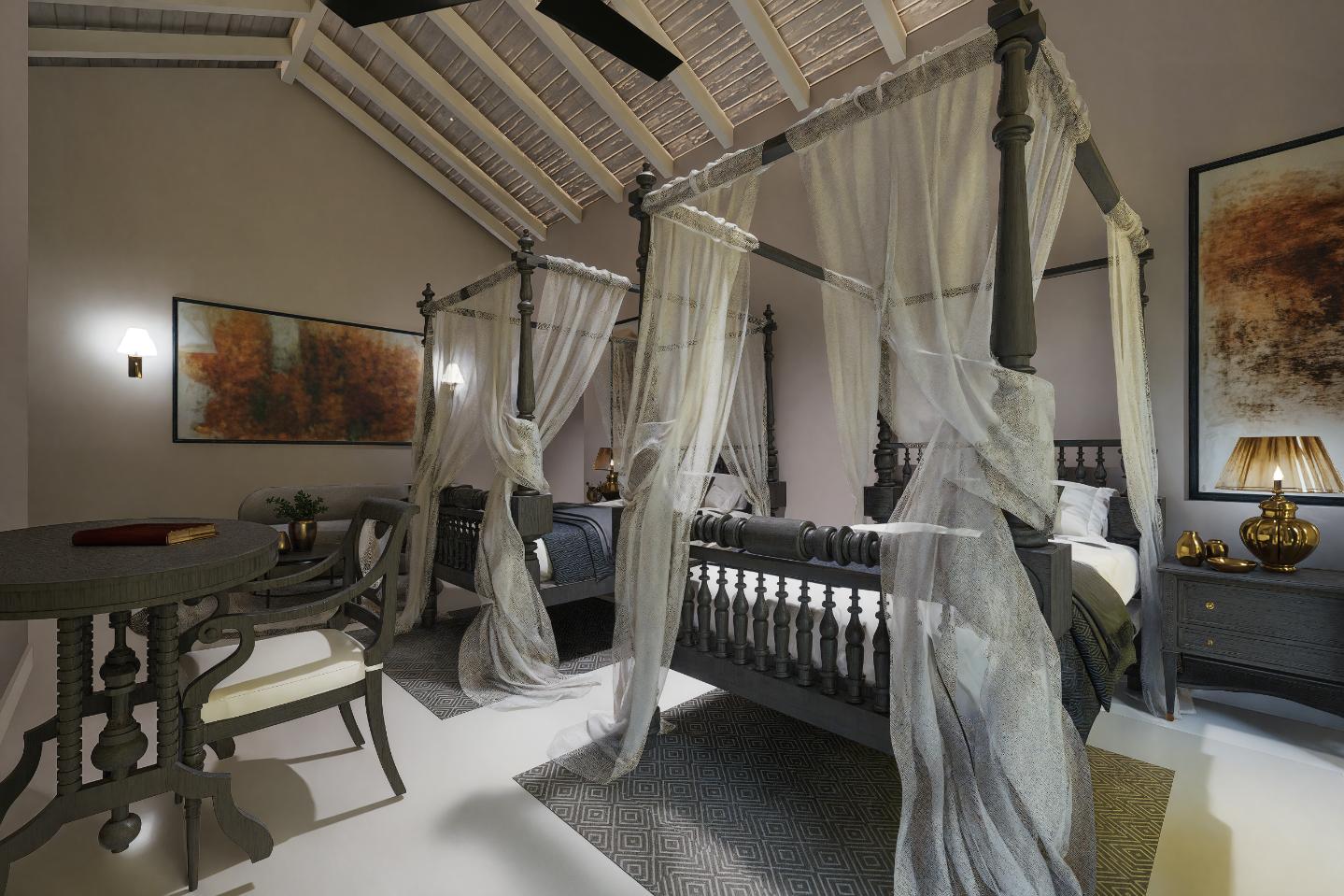 Elegant bedroom with two canopy beds at IF Villa