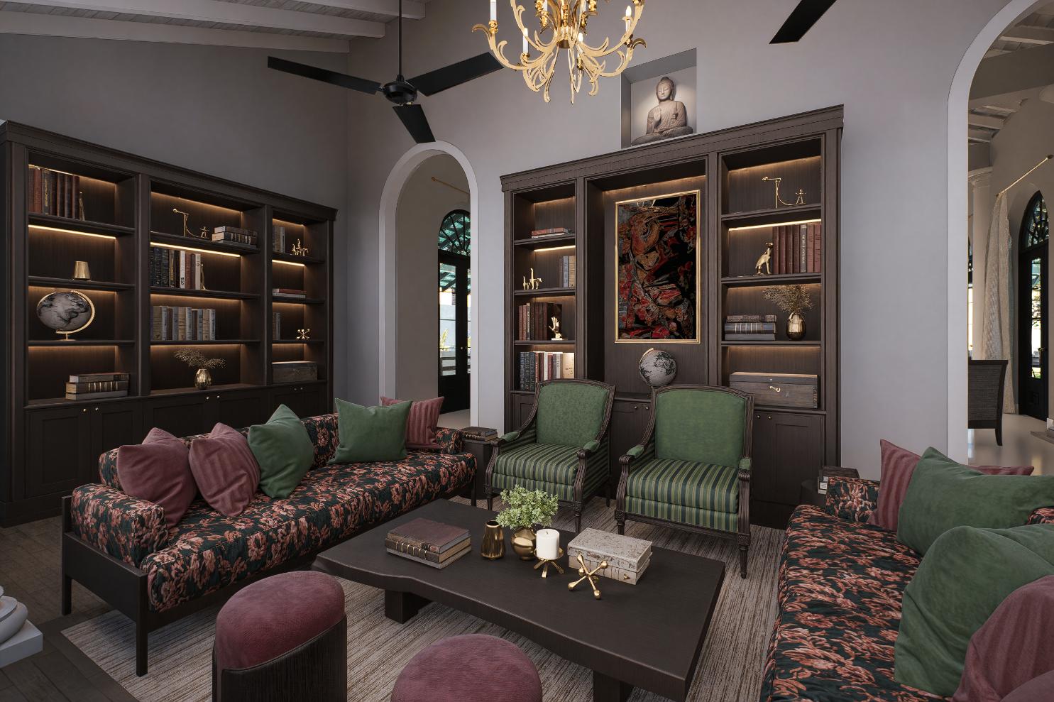 Living area with wood bookshelves, couches & armchairs at IF Villa