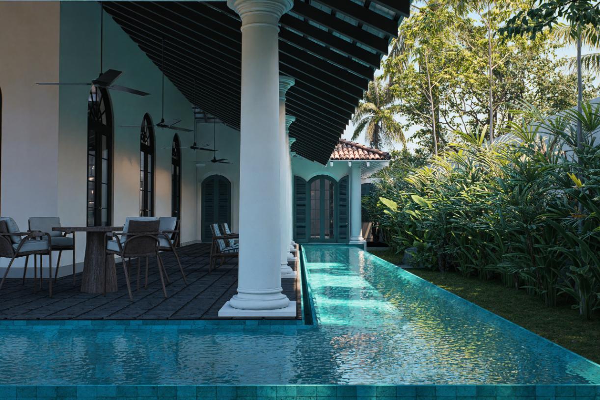 Poolside colonnade at IF Villa with lush garden